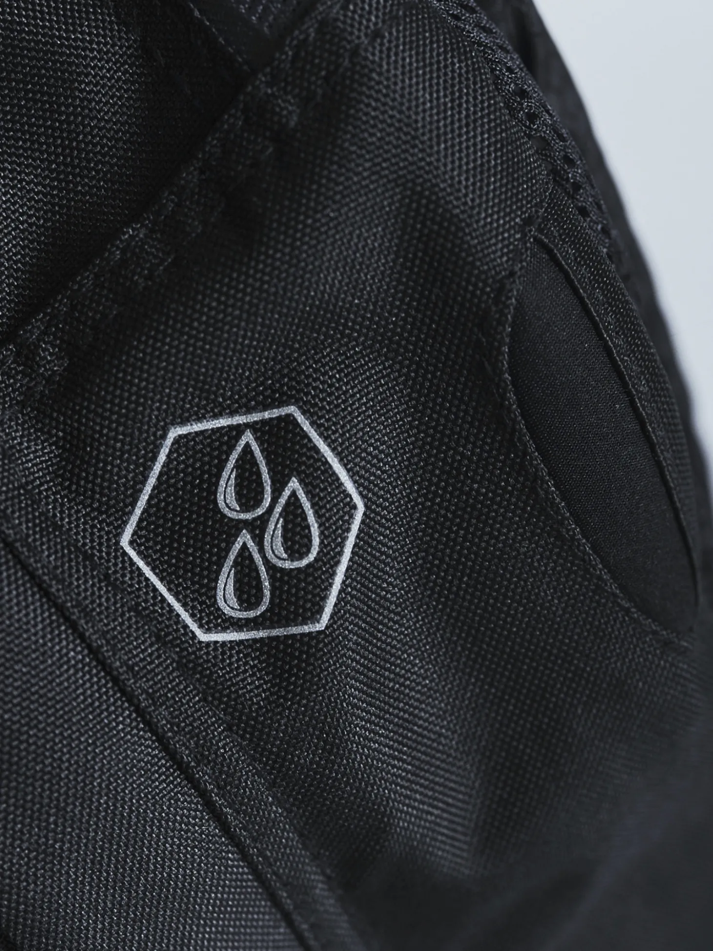 MANTO Rucksack CROSS schwarz reflektierend